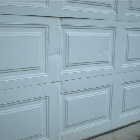 dented garage door